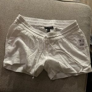 White linen under bump maternity shorts